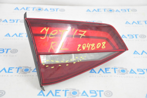 Inner taillight trunk lid left VW Jetta 16-18 USA halogen dark, crack on glass