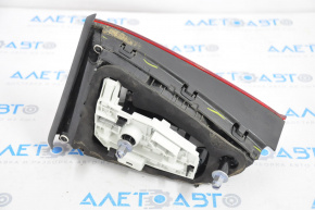 Inner taillight trunk lid left VW Jetta 16-18 USA halogen dark, crack on glass