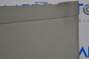 Door trim card rear right Toyota Sienna 11-14 beige, broken crepe, crack, plastic turned white