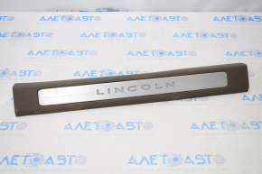 Door sill trim front left Lincoln MKC 15-16 brown chrome with backlight, broken fastener