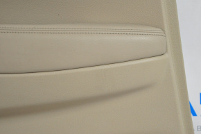 Door trim card rear left Nissan Rogue 14-16 beige, scratch