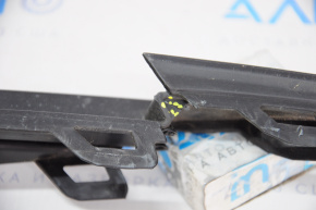 Front bumper lower grille plug left VW Jetta 19-21 broken fastener, crack