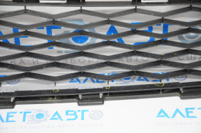 Lower grille front bumper Nissan Rogue 14-16 tears in the lower part