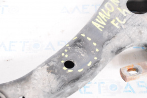 Lower front left arm Toyota Avalon 13-18 is dented, silent block is torn