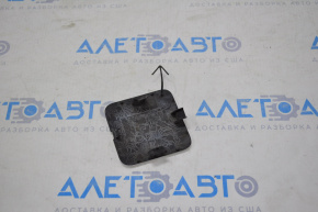 Nissan Versa 12-14 usa front bumper tow hook plug