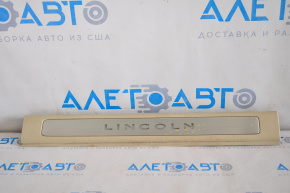 Door sill trim front right Lincoln MKZ 13-16 beige, chrome with backlight, scratches
