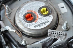 Black steering wheel airbag for the driver's side of the Nissan Leaf 13-15.