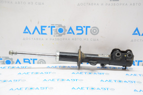 Shock absorber front right Nissan Versa Note 13-19