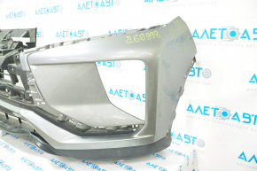 Front bumper bare Mitsubishi Eclipse Cross 18-20 silver, dented, cracks in grille
