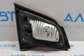 The right inner trunk lid light of a Subaru Legacy 15-19 has microcracks.