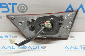 Left inner trunk lid light for Toyota Avalon 13-15, housing crack, glass chip