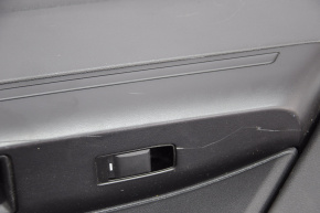 Door trim card rear right Jeep Patriot 11-17 black with black insert plastic, armrest rubber, scratches