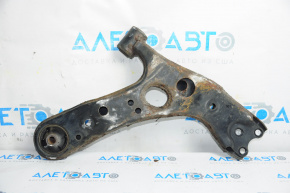 The lower front left control arm of a Lexus CT200h 11-17 is rusty and the silent block is torn.