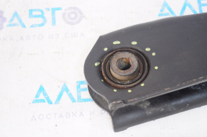 The lower rear left control arm of a Dodge Journey 11-20 has a torn silent block.