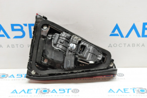 Right inner trunk lid light for VW Passat B8 16-19 USA, dark, cracked, without trim