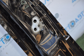 The central right body pillar of Ford Edge 15-24 is dented