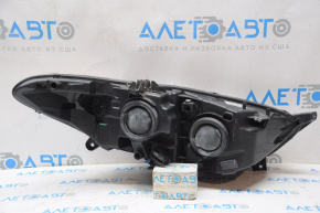 Front left headlight bare Ford Fusion mk5 13-16 lens is loose, needs repair