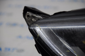 Front left headlight bare Ford Fusion mk5 13-16 lens is loose, needs repair