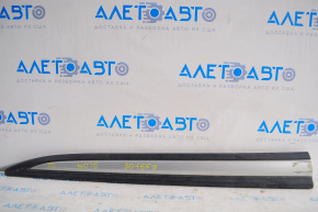 Mitsubishi Outlander 16-20 lower front left door trim is worn