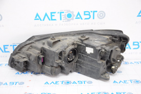Headlight front right VW Passat b7 12-15 USA bare halogen, melted reflector, no plug