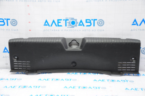 Kia Forte 4d 14-18 trunk opening trim is worn