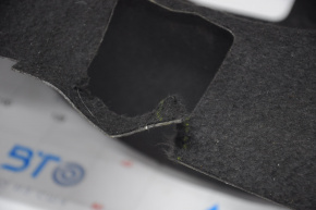 The flooring of the trunk of the Porsche Cayenne 958 11-14 is black, torn