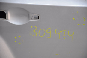 Bare rear right door Jeep Patriot 11-17 silver PSC, dented bottom, bumps