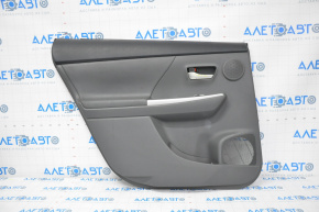 Door trim card rear left Toyota Prius V 12-14 dark gray leather under JBL speaker, leather defect
