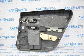Door trim card rear left Toyota Prius V 12-14 dark gray leather under JBL speaker, leather defect
