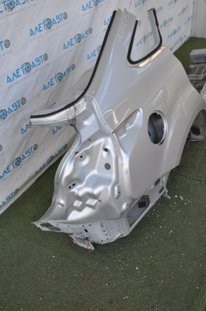 Quarter wing rear right Ford Focus mk3 11-18 4d silver, with central pillar, dented