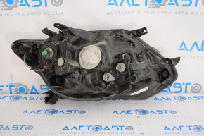 Headlight front left Nissan Rogue 14-16 bare halogen, water damage