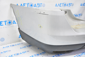 Rear bumper bare Nissan Rogue 14-16 silver, tear of crepe, scratches, hole