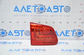 Inner taillight trunk lid left VW Tiguan 12-18 rest, chipped glass corner