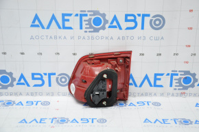 Inner taillight trunk lid left VW Tiguan 12-18 rest, chipped glass corner