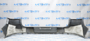 Rear bumper bare VW Tiguan 12-18 rest upper part silver, broken fastener
