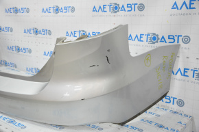 Rear bumper bare Ford Focus mk3 15-18 rest 4d silver UX, broken fasteners