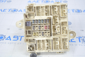 The fuse box under the dashboard of a Lexus IS200 IS300 99-05 has a broken mount.