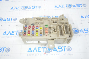 The Lexus ES 300/330 under-dash fuse box has cracks and broken fasteners.