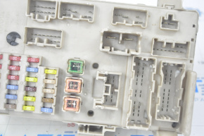 The Lexus ES 300/330 under-dash fuse box has cracks and broken fasteners.