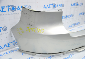 Rear bumper bare VW Tiguan 12-18 rest upper part silver, broken fastener