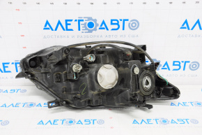 Headlight front left Nissan Rogue 14-16 bare halogen, water damage