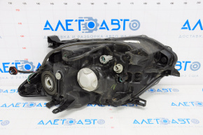 Headlight front right Nissan Rogue 14-16 bare halogen, water damage