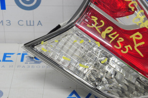Light inside trunk lid left Nissan Rogue 14-16 cracks