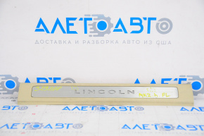 Door sill trim front left Lincoln MKZ 13-16 chrome with backlight, beige, scratches, bumps, broken crepe