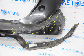 Rear bumper bare Lincoln MKC 15-19 black, missing right part, broken fasteners, dented, scratches