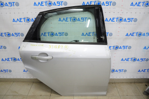 Door assembly rear right Ford Focus mk3 11-18 silver UX, dented