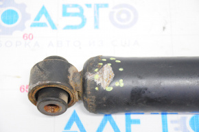 Shock absorber rear left Nissan Rogue 14-17 small silent block, dented