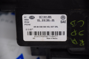 Headlight front left VW Jetta 11-16 bare USA halogen, water damage, without plug