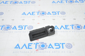 Handle with button for opening the trunk lid outside VW Jetta 11-16 USA under the camera