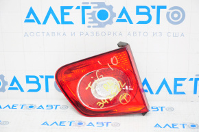 Inner taillight trunk lid left VW Tiguan 09-11 pre-rest, peeling chrome